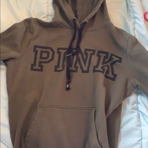 Pink sweatshirt.